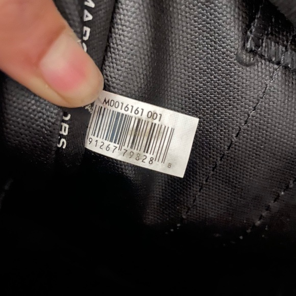 Marc Jacob’s. All black tote and white lettering. It is 13 inches. - Picture 6 of 7